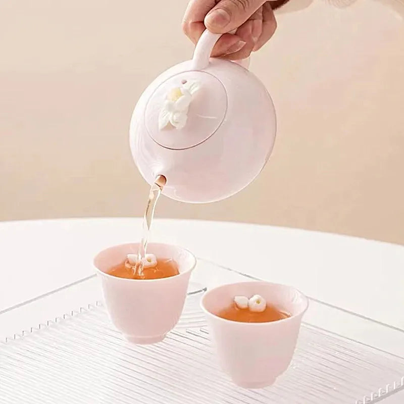 Handcrafted Pink Flower Tea Set High Appearance Lovely Ceramic Teapot and Cup Set Customized Ball Hole Filter Tea Infuser